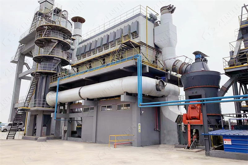 Operator monitoring grinding mill control panel